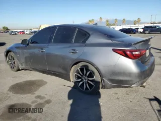 2019 Infiniti Q50 Luxe with VIN JN1EV7AP8KM514379, listed as a Copart auction lot 46948985 with 103,756 mi miles and Salvage title. Bid and sale history available at DreamBid. Image 2.