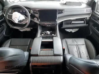 2023 Jeep Wagoneer Series II with VIN 1C4SJSBPXPS529935, listed as a Copart auction lot 42969005 with 34,453 mi miles and Clean title. Bid and sale history available at DreamBid. Image 8.