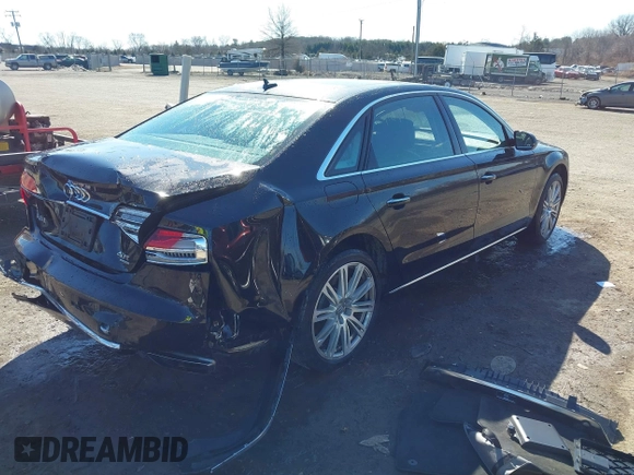 2015 Audi A8 L 4.0T with VIN WAU32AFD1FN021343, listed as a IAAI auction lot 41634469 with 88,229 mi miles. Bid and sale history available at carsss.com. Image 4.