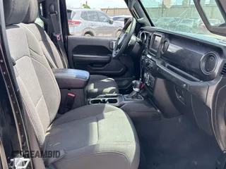 2023 Jeep Wrangler Sport S with VIN 1C4HJXDG2PW615754, listed as a Copart auction lot 53884255 with 34,427 mi miles and Clean Title. Bid and sale history available at DreamBid. Image 5.
