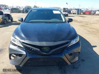 2018 Toyota Camry LE with VIN JTNB11HKXJ3071137, listed as a IAAI auction lot 41699856 with 102,310 mi miles. Bid and sale history available at carsss.com. Image 12.