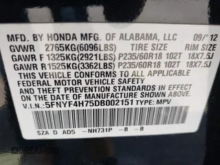 2013 Honda Pilot EX-L with VIN 5FNYF4H75DB002151, listed as a IAAI auction lot 42141451 with 223,651 mi miles and . Bid and sale history available at DreamBid. Image 9.