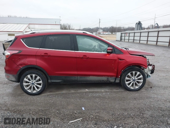 2017 Ford Escape Titanium with VIN 1FMCU9J95HUA48807, listed as a IAAI auction lot 41522636 with 218,342 mi miles. Bid and sale history available at carsss.com. Image 13.
