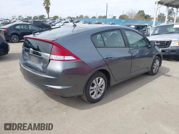 2012 Honda Insight EX z VIN JHMZE2H73CS000751, wystawiony jako IAAI lot #41687288 z przebiegiem 181 593 mil mil oraz . Historia ofert i sprzedaży dostępna na DreamBid. Obrazek 4.