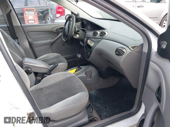 2003 Ford Focus LX with VIN 1FAFP33P73W156382, listed as a IAAI auction lot 41591885 with 174,169 mi miles and . Bid and sale history available at carsss.com. Image 5.