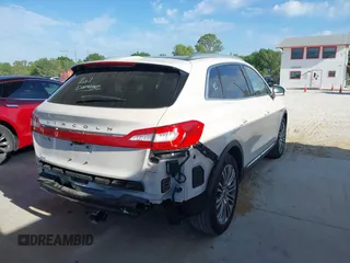 2017 Lincoln MKX Reserve with VIN 2LMPJ6LR6HBL52244, listed as a IAAI auction lot 41908684 with 77,886 mi miles. Bid and sale history available at carsss.com. Image 4.
