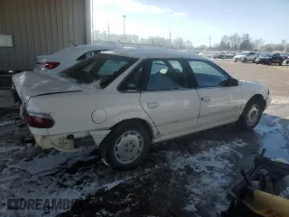1995 Ford Taurus GL with VIN 1FALP52U0SA258107, listed as a Copart auction lot 46450475 with 169,426 mi miles and Salvage Title. Bid and sale history available at carsss.com. Image 3.