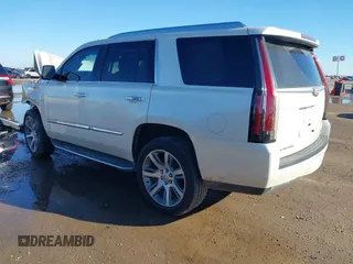 2015 Cadillac Escalade Luxury z VIN 1GYS3MKJXFR651714, wystawiony jako IAAI lot #41205449 z przebiegiem 129 066 mil mil oraz . Historia ofert i sprzedaży dostępna na DreamBid. Obrazek 3.