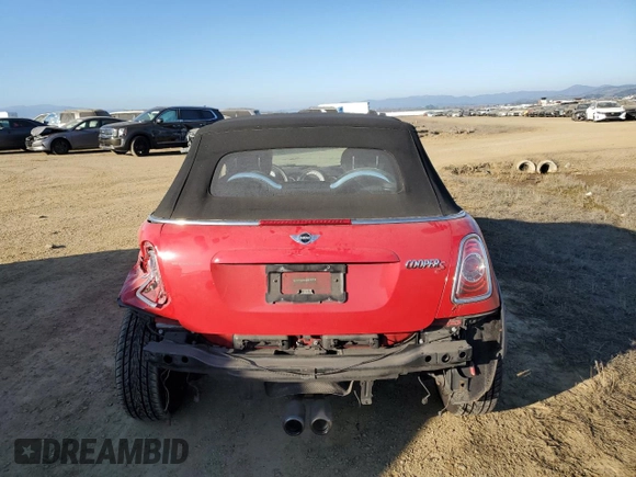 2014 MINI Convertible S with VIN WMWZP3C54ET298129, listed as a Copart auction lot 88523065 with 54,788 mi miles and Salvage title. Bid and sale history available at DreamBid. Image 6.