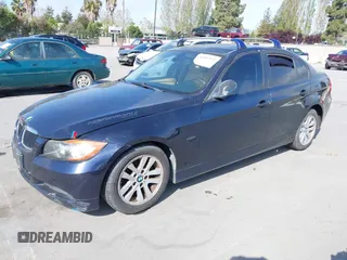 2007 BMW 3 Series 328i with VIN WBAVC53587FZ71348, listed as a IAAI auction lot 42057532 with 198,307 mi miles and . Bid and sale history available at carsss.com. Image 2.