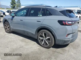 2023 Volkswagen ID.4 Pro with VIN 1V2VMPE86PC042164, listed as a Copart auction lot 50260215 with 4,328 mi miles and Clean Title. Bid and sale history available at DreamBid. Image 2.
