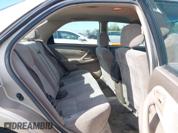 2000 Toyota Camry LE z VIN JT2BF22K5Y0258522, wystawiony jako IAAI lot #41998874 z przebiegiem 300 186 mil mil oraz . Historia ofert i sprzedaży dostępna na DreamBid. Obrazek 8.