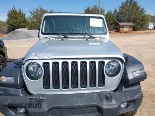 2023 Jeep Wrangler Sport z VIN 1C4HJXDG0PW582947, wystawiony jako IAAI lot #41932930 z przebiegiem 19 670 mil mil oraz . Historia ofert i sprzedaży dostępna na DreamBid. Obrazek 12.