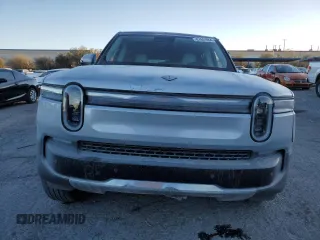 2025 Rivian R1S Adventure with VIN 7PDSGBBA0SN051096, listed as a Copart auction lot 87441054 with 30 mi miles and Salvage Title. Bid and sale history available at carsss.com. Image 5.