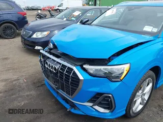 2020 Audi Q3 S line Premium z VIN WA1DECF39L1013425, wystawiony jako IAAI lot #41851042 z przebiegiem 57 901 mil mil oraz . Historia ofert i sprzedaży dostępna na DreamBid. Obrazek 20.