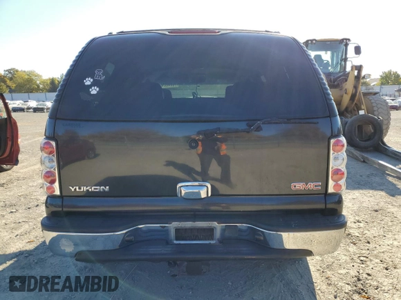 2004 GMC Yukon SLE with VIN 1GKEK13V24J236327, listed as a Copart auction lot 76896974 with 151,028 mi miles and Salvage Title. Bid and sale history available at carsss.com. Image 6.