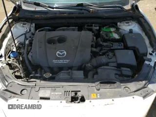 2016 Mazda 3 S Touring with VIN JM1BM1M32G1355182, listed as a Copart auction lot 61582365 with 144,159 mi miles and Salvage title. Bid and sale history available at DreamBid. Image 12.