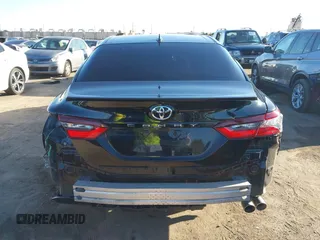 2021 Toyota Camry SE Nightshade with VIN 4T1G11AK2MU477363, listed as a IAAI auction lot 41675959 with 57,507 mi miles. Bid and sale history available at carsss.com. Image 17.