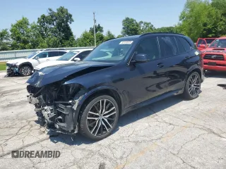 2019 BMW X5 xDrive40i with VIN 5UXCR6C52KLL06923, listed as a Copart auction lot 60109655 with 90,374 mi miles and Salvage title. Bid and sale history available at DreamBid. Image 1.