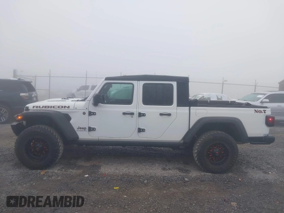 2022 Jeep Gladiator Rubicon z VIN 1C6JJTBG3NL111054, wystawiony jako IAAI lot #40793144 z przebiegiem 40 115 mil mil oraz . Historia ofert i sprzedaży dostępna na DreamBid. Obrazek 15.
