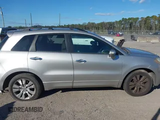 2010 Acura RDX Technology z VIN 5J8TB1H59AA005059, wystawiony jako IAAI lot #40879854 z przebiegiem 213 955 mil mil oraz . Historia ofert i sprzedaży dostępna na DreamBid. Obrazek 13.