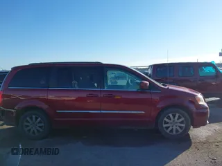 2013 Chrysler Town & Country Touring with VIN 2C4RC1BG2DR758951, listed as a IAAI auction lot 41136184 with 134,784 mi miles. Bid and sale history available at carsss.com. Image 13.