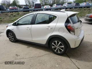 2018 Toyota Prius One z VIN JTDKDTB38J1615672, wystawiony jako Copart lot #53270015 z przebiegiem 55 974 mil mil oraz Czysty tytuł • Clean title. Historia ofert i sprzedaży dostępna na DreamBid. Obrazek 2.