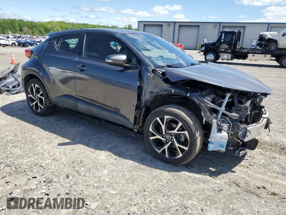 2018 Toyota C-HR XLE z VIN NMTKHMBXXJR046516, wystawiony jako Copart lot #53486395 z przebiegiem 95 741 mil mil oraz Czysty tytuł • Clean title. Historia ofert i sprzedaży dostępna na DreamBid. Obrazek 4.