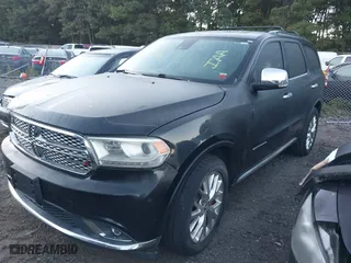 2014 Dodge Durango Citadel with VIN 1C4RDJEG3EC277996, listed as a IAAI auction lot 40517339 with 999,999 mi miles. Bid and sale history available at carsss.com. Image 17.