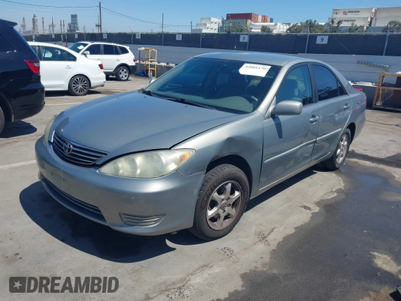 2006 Toyota Camry STD with VIN 4T1BE32K06U675483, listed as a IAAI auction lot 42001170 with 142,783 mi miles. Bid and sale history available at carsss.com. Image 2.