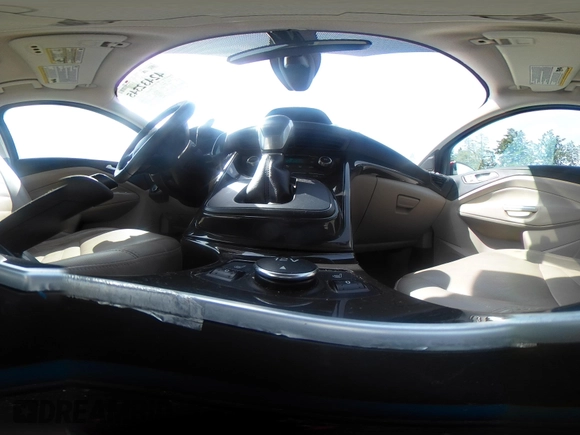 2015 Ford Escape Titanium with VIN 1FMCU9J93FUB28037, listed as a IAAI auction lot 42432345 with 133,242 mi miles and . Bid and sale history available at DreamBid. Image 18.
