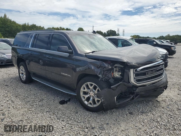 2015 GMC Yukon XL SLE z VIN 1GKS1GKC2FR625157, wystawiony jako Copart lot #69628124 z przebiegiem 153 022 mil mil oraz Szkoda całkowita • Salvage title. Historia ofert i sprzedaży dostępna na DreamBid. Obrazek 4.