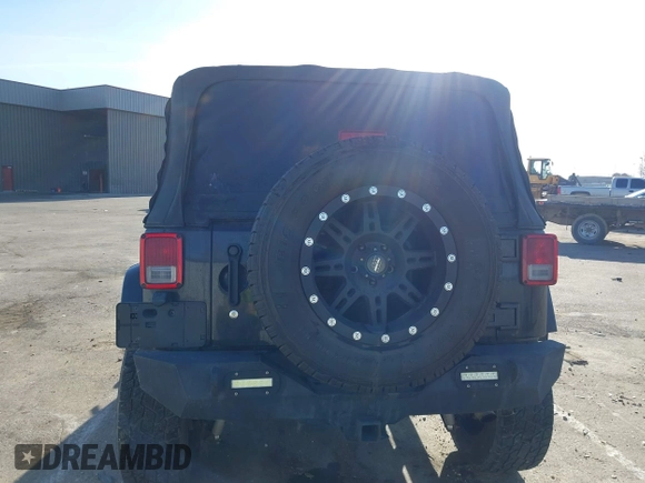 2011 Jeep Wrangler Sahara with VIN 1J4AA5D14BL514060, listed as a IAAI auction lot 41142809 with Not Provided miles and . Bid and sale history available at DreamBid. Image 12.
