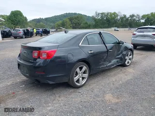 2013 Chevrolet Malibu LTZ with VIN 1G11J5SX1DF191366, listed as a IAAI auction lot 40121794 with 111,036 mi miles. Bid and sale history available at carsss.com. Image 4.