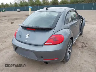 2012 Volkswagen Beetle with VIN 3VWV67AT0CM663718, listed as a IAAI auction lot 41860510 with 99,932 mi miles and . Bid and sale history available at DreamBid. Image 4.