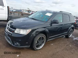 2014 Dodge Journey SXT with VIN 3C4PDCBG1ET127798, listed as a IAAI auction lot 41799898 with 178,873 mi miles and . Bid and sale history available at DreamBid. Image 2.