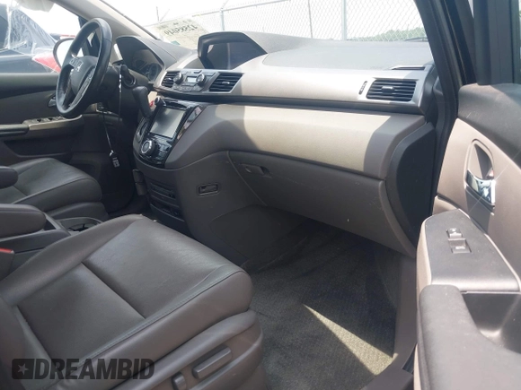 2015 Honda Odyssey Touring Elite with VIN 5FNRL5H90FB003506, listed as a IAAI auction lot 42585049 with 120,543 mi miles and . Bid and sale history available at DreamBid. Image 5.