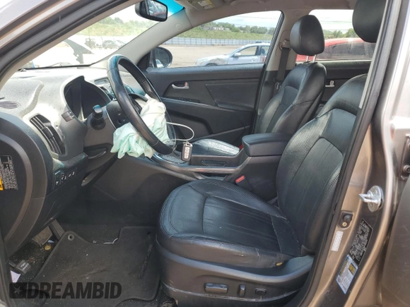 2013 Kia Sportage EX with VIN KNDPCCA25D7402214, listed as a Copart auction lot 60106115 with 146,369 mi miles and Salvage title. Bid and sale history available at DreamBid. Image 7.