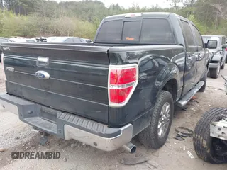 2014 Ford F-150 XL with VIN 1FTFW1CT9EKG41762, listed as a IAAI auction lot 41797534 with 218,089 mi miles. Bid and sale history available at carsss.com. Image 4.