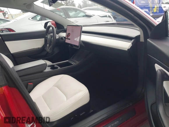 2021 Tesla Model 3 Long Range with VIN 5YJ3E1EB3MF862392, listed as a IAAI auction lot 41765987 with 51,915 mi miles and . Bid and sale history available at DreamBid. Image 5.