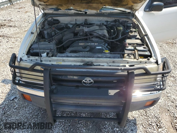 1999 Toyota Tacoma PreRunner with VIN 4TASN92NXXZ551335, listed as a Copart auction lot 62199645 with 198,754 mi miles and Salvage title. Bid and sale history available at DreamBid. Image 11.