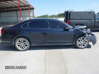 2019 Volkswagen Passat 2.0T Wolfsburg Edition with VIN 1VWLA7A30KC009646, listed as a IAAI auction lot 39842320 with 101,006 mi miles. Bid and sale history available at carsss.com. Image 14.