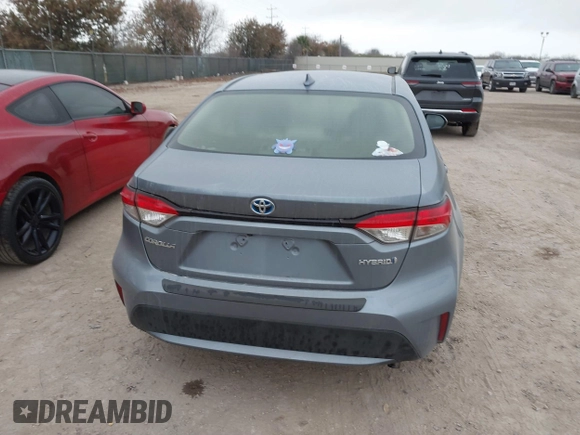 2021 Toyota Corolla Hybrid LE with VIN JTDEAMDE8MJ002711, listed as a IAAI auction lot 41498716 with 98,559 mi miles. Bid and sale history available at carsss.com. Image 15.