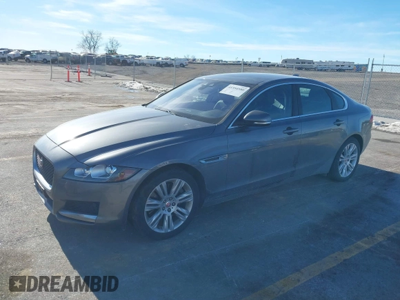 2016 Jaguar XF 35t Premium with VIN SAJBD4BVXGCY14096, listed as a IAAI auction lot 41354580 with 98,748 mi miles. Bid and sale history available at carsss.com. Image 2.