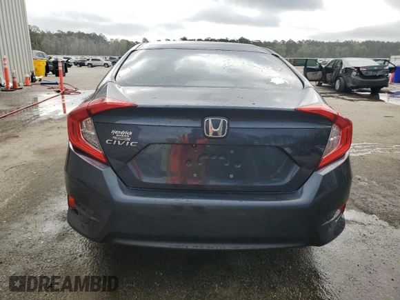 2017 Honda Civic LX with VIN 19XFC2F53HE033738, listed as a Copart auction lot 51534615 with 129,960 mi miles and Salvage Title. Bid and sale history available at DreamBid. Image 6.