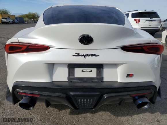 2023 Toyota GR Supra 3.0 with VIN WZ1DB0G00PW055929, listed as a Copart auction lot 76407574 with 16,889 mi miles and Salvage Title. Bid and sale history available at carsss.com. Image 6.