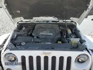 2016 Jeep Wrangler Unlimited Rubicon with VIN 1C4BJWFG9GL103312, listed as a Copart auction lot 52559465 with 79,692 mi miles and Salvage Title. Bid and sale history available at carsss.com. Image 11.