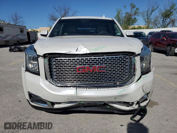 2017 GMC Yukon Denali with VIN 1GKS2CKJ5HR310702, listed as a Copart auction lot 51914245 with 115,205 mi miles and Salvage Title. Bid and sale history available at carsss.com. Image 5.