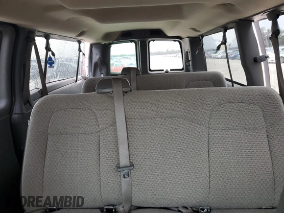 2010 Chevrolet Express Passenger LT z VIN 1GA2G1DG7A1107293, wystawiony jako Copart lot #78936284 z przebiegiem 178 012 mil mil oraz Szkoda całkowita • Salvage title. Historia ofert i sprzedaży dostępna na DreamBid. Obrazek 10.