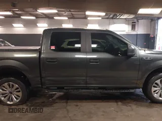 2018 Ford F-150 XL with VIN 1FTEW1EP5JFC37436, listed as a IAAI auction lot 41807561 with 133,159 mi miles and . Bid and sale history available at carsss.com. Image 13.